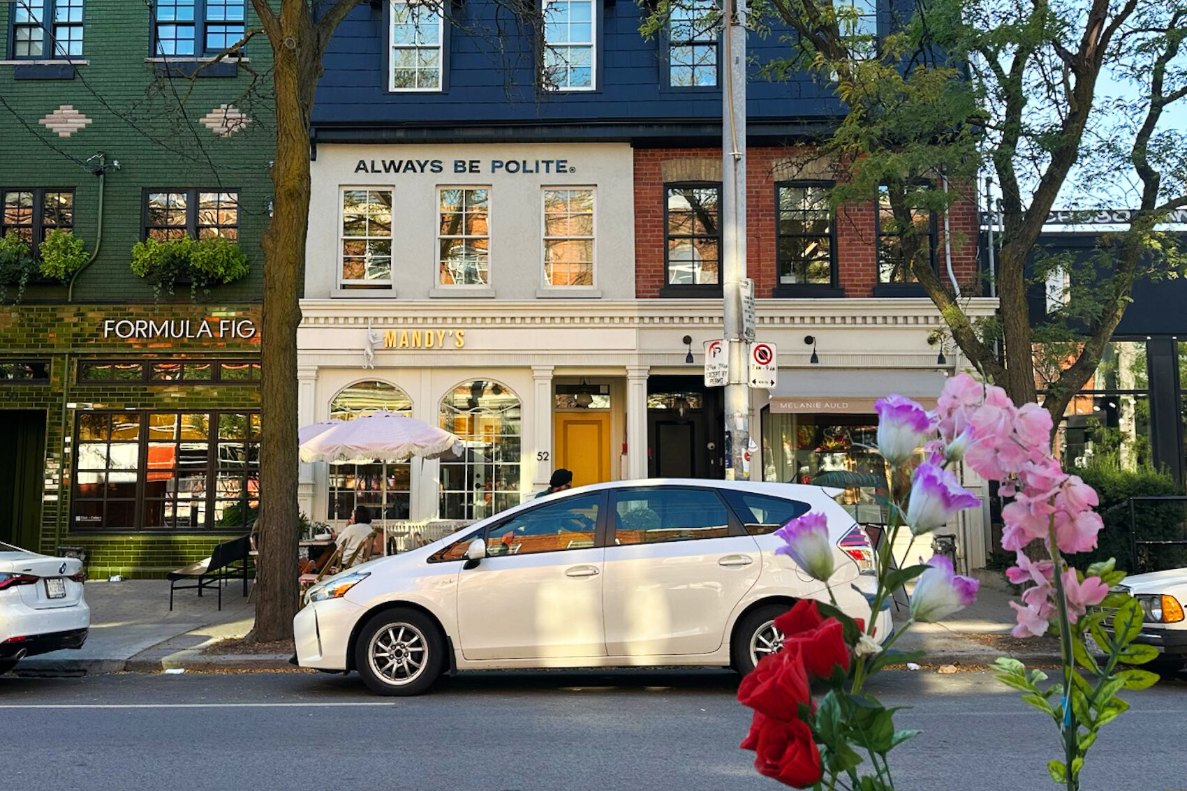 a city street with businesses