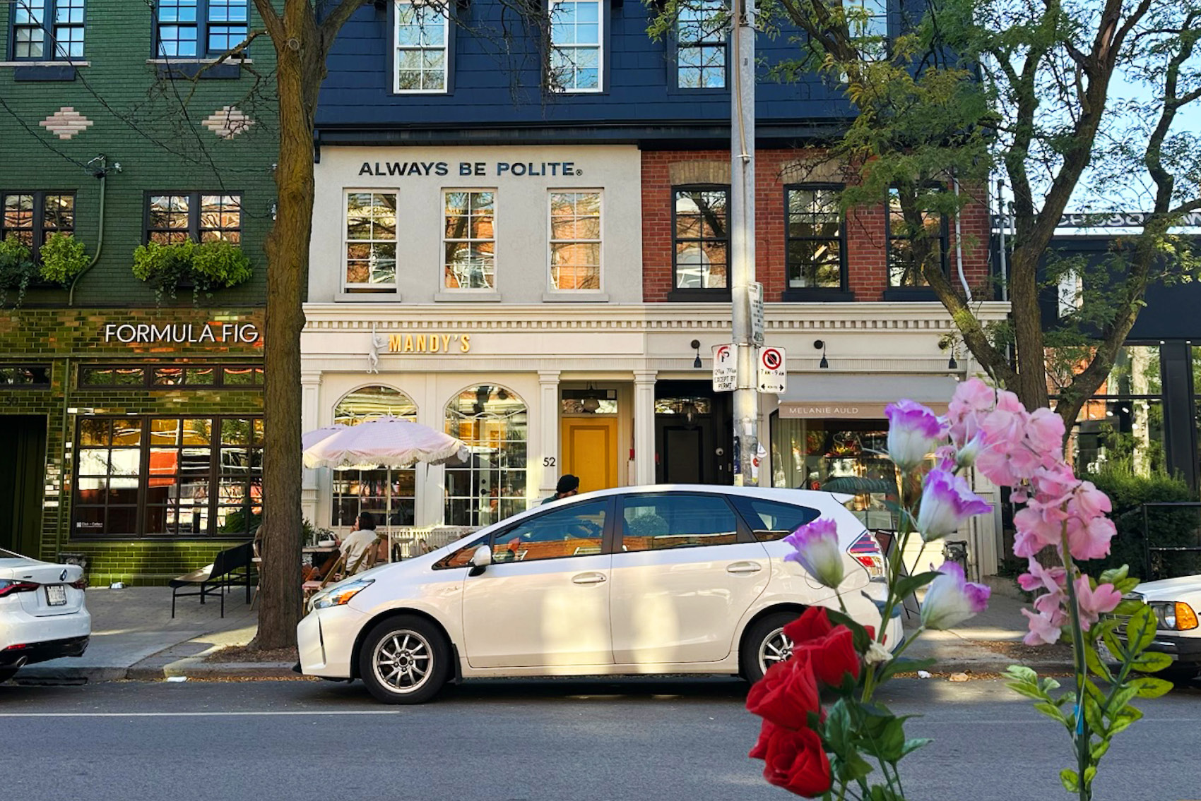 a city street with businesses