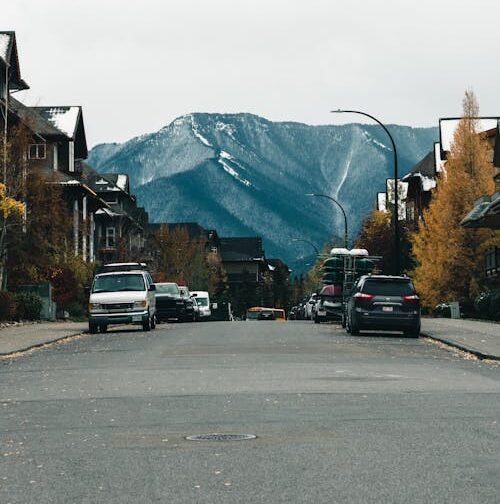 Canmore-Alberta-residential-street-with-mountains-in-background