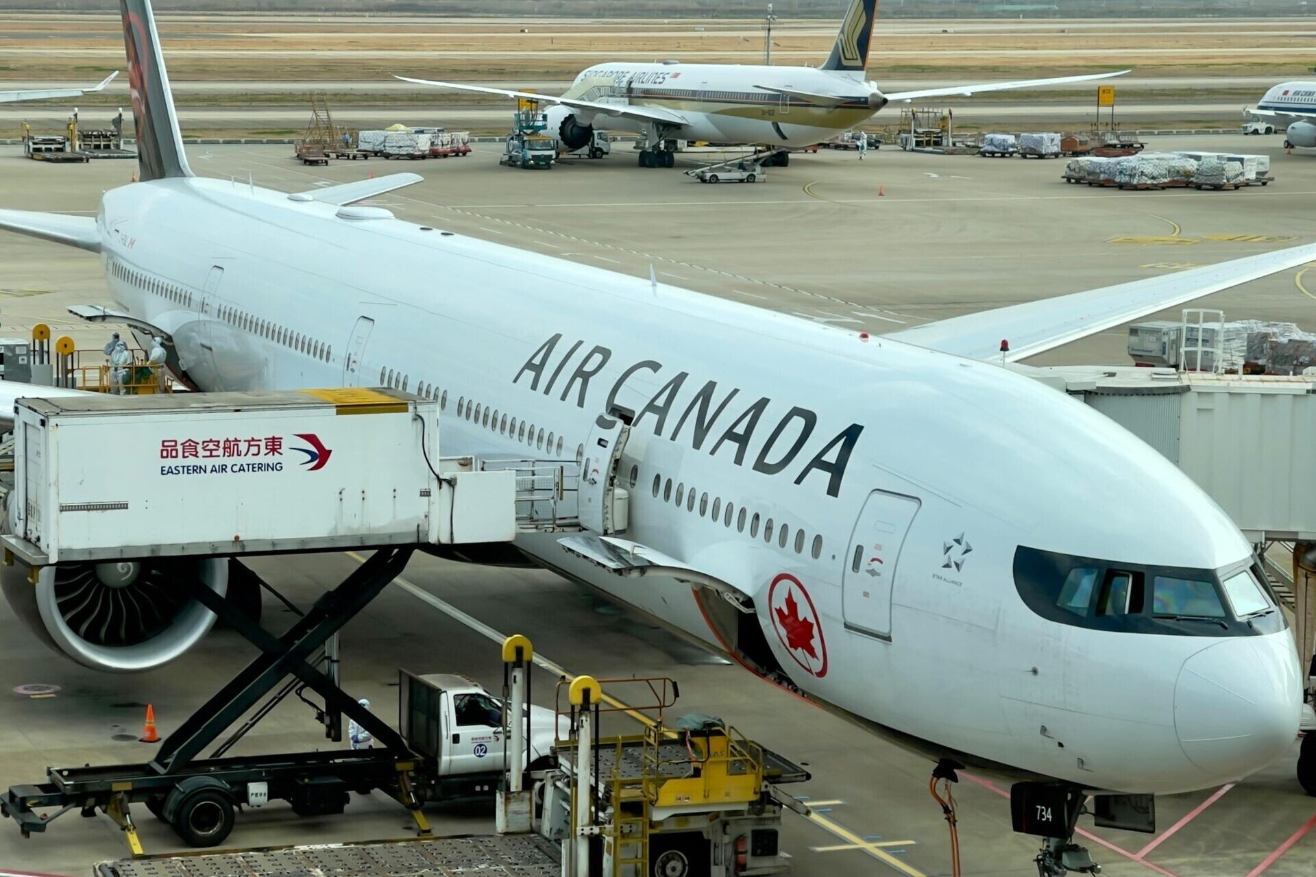 Air Canada airplane on runway loading up