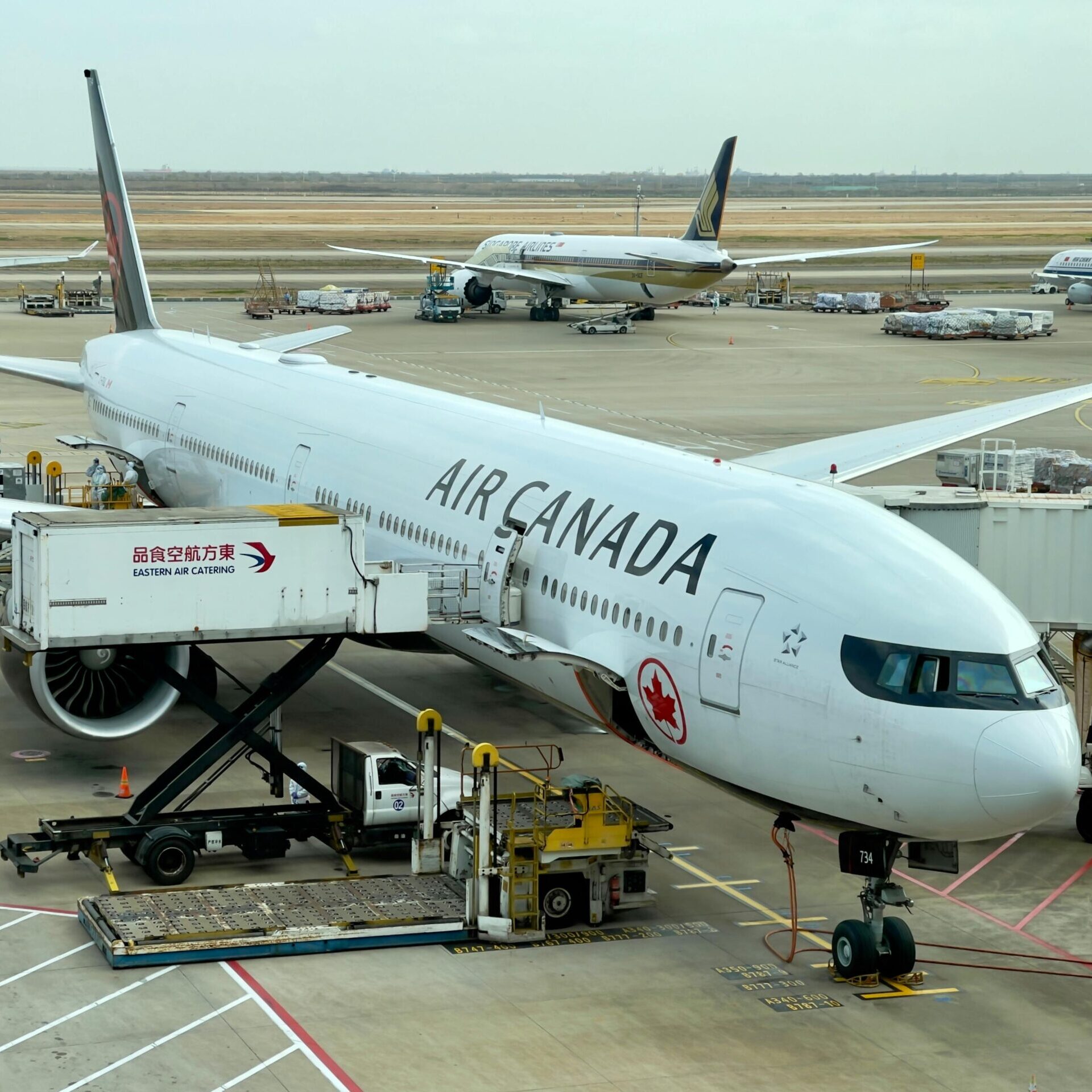 Air Canada airplane on runway loading up