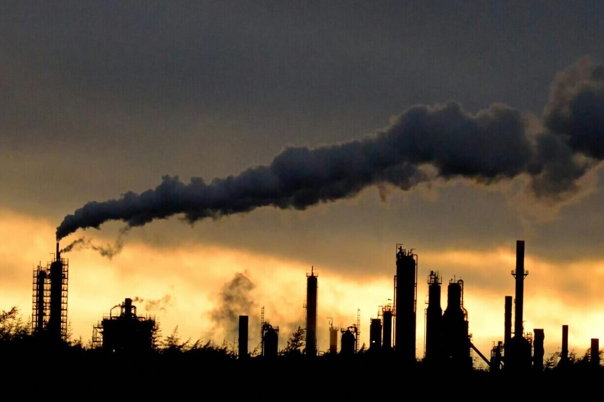 Oil refinery at sunset in Canada