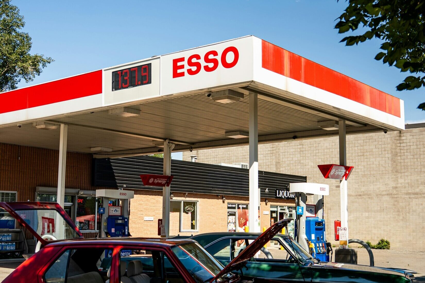Esso gas station with two cars
