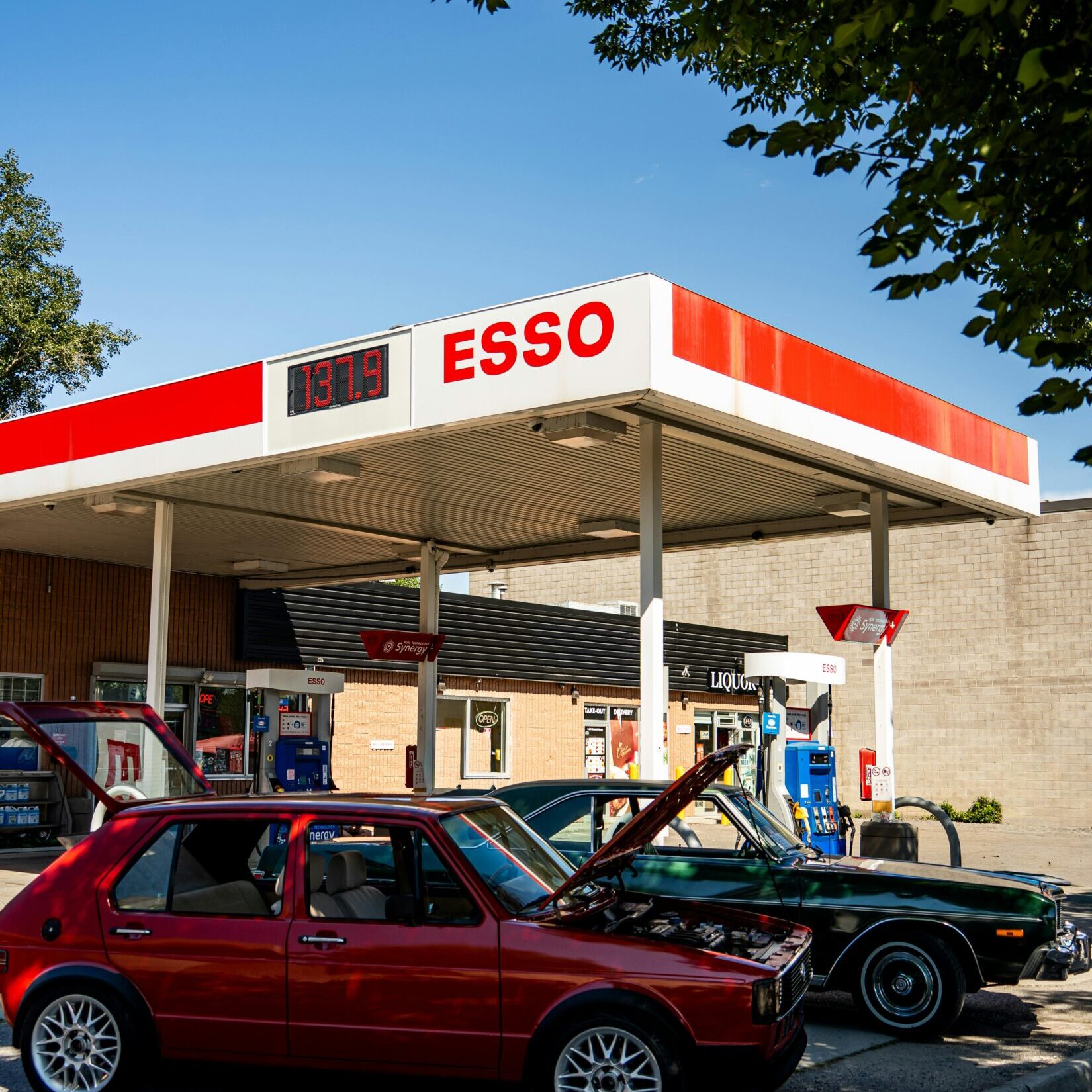 Esso gas station with two cars