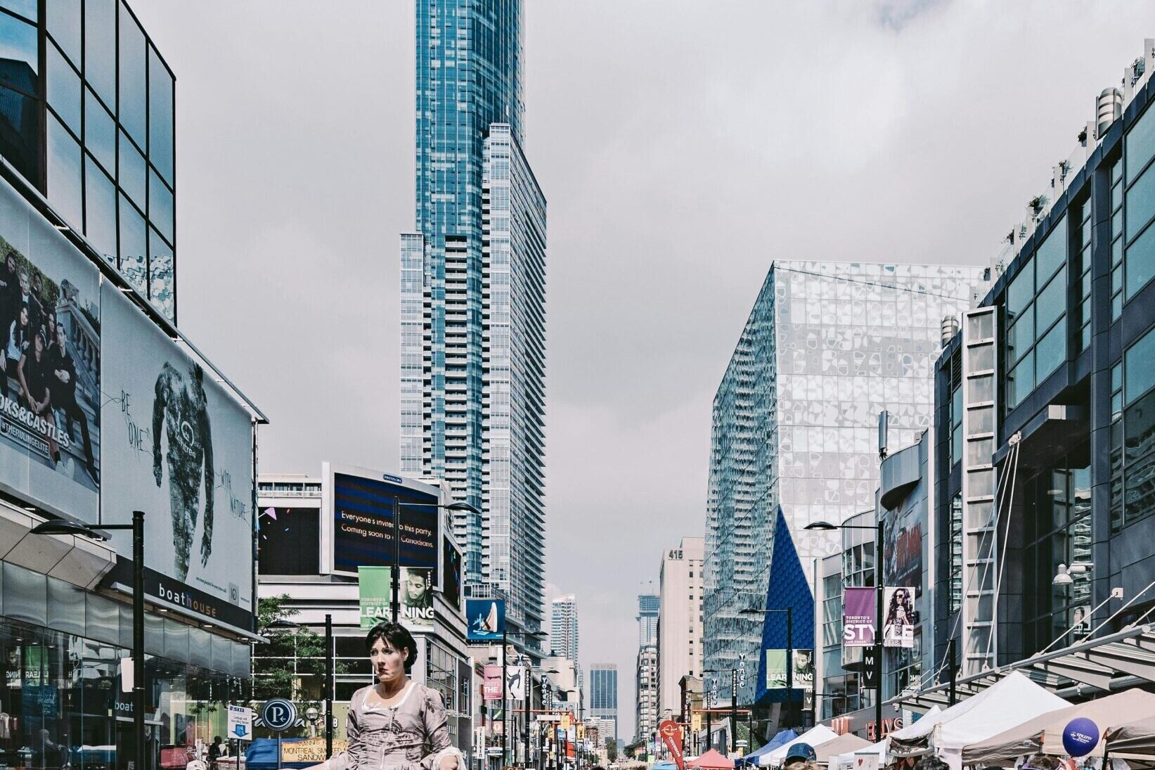 Bustling market with street performers in Toronto Canada